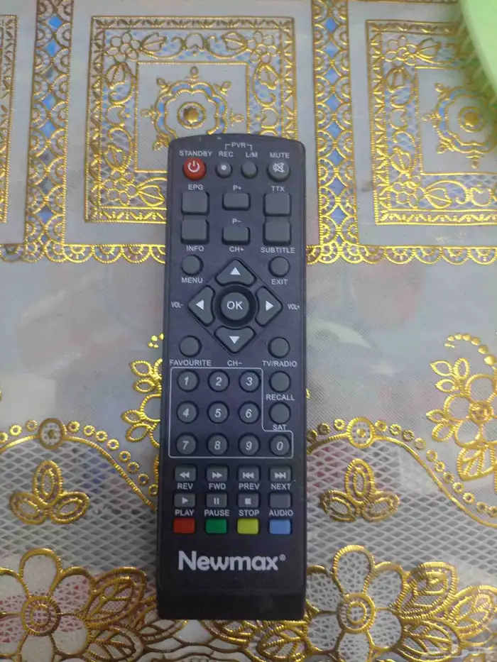 ريموت رسيفر بحاله جيده شركه نيوماكس 0