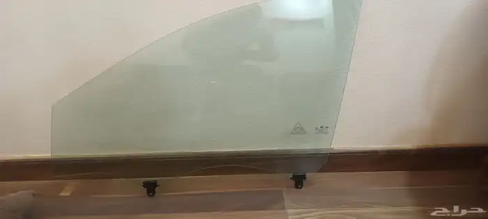 زجاج باب سائق اصلي 1