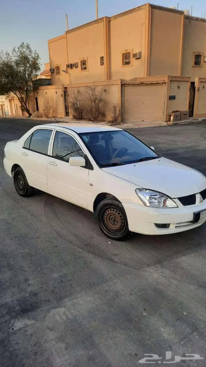 ميتسوبيشي لانسر GLX بومه 2011 9