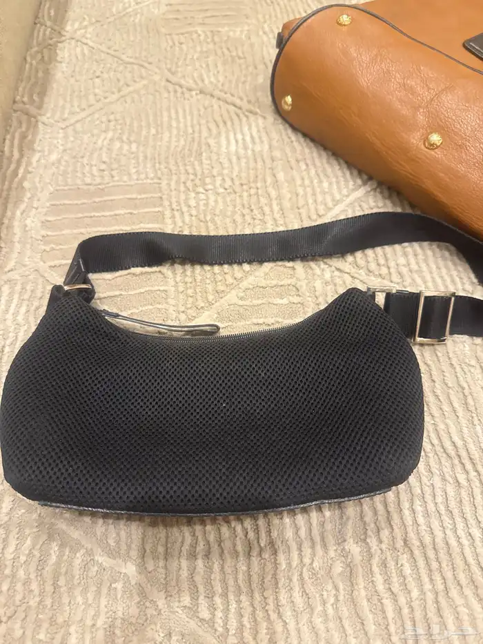 شنطة (مجموعة ) من ماركات مختلفة 5