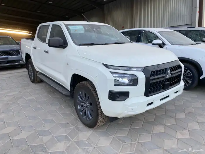 متسوبيشي L200 ديزل دبل غمارتين نص فل سعودي 2024 1