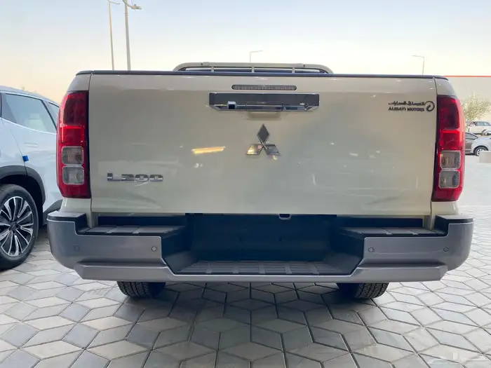 متسوبيشي L200 ديزل دبل غمارتين نص فل سعودي 2024 3