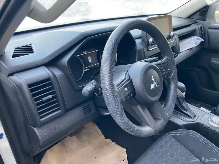 متسوبيشي L200 ديزل دبل غمارتين نص فل سعودي 2024 5