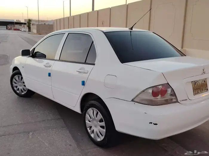 لانسر 2014 اتوماتيك ممشى 350الف 2