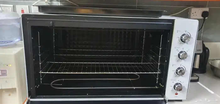 فرن كهربائي جديد مع صاجه 0