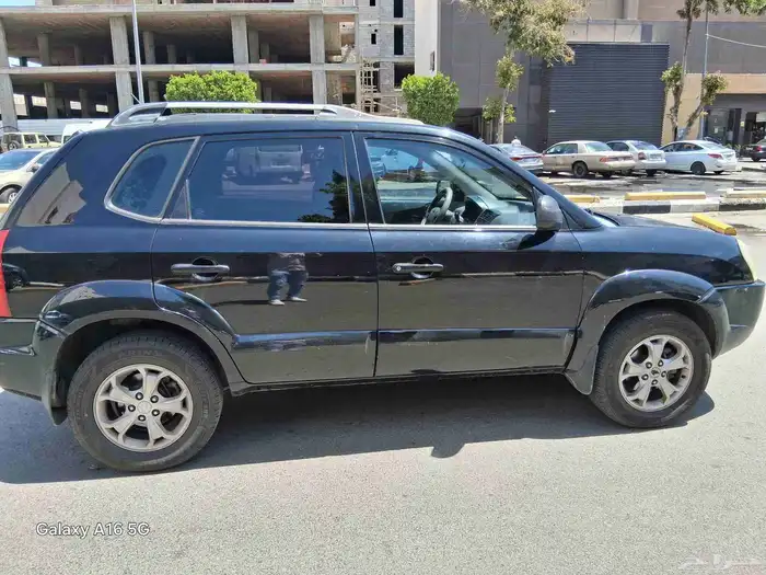 توسان 2009 نص فل جير انومك كفرات شبه جديد شاشه مسجل بو 0