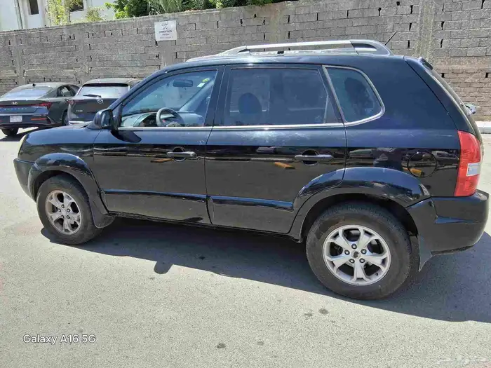 توسان 2009 نص فل جير انومك كفرات شبه جديد شاشه مسجل بو 2