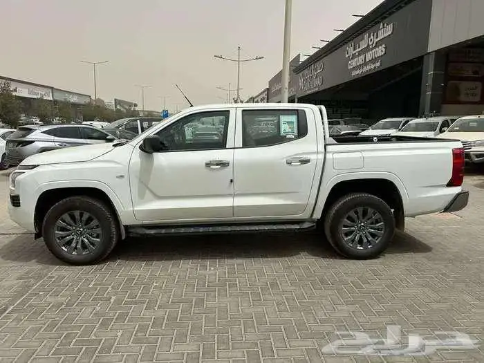 ميتسوبيشي L200 غمارتين دبل اتوماتيك ديزل جنط 18 2024 . 2