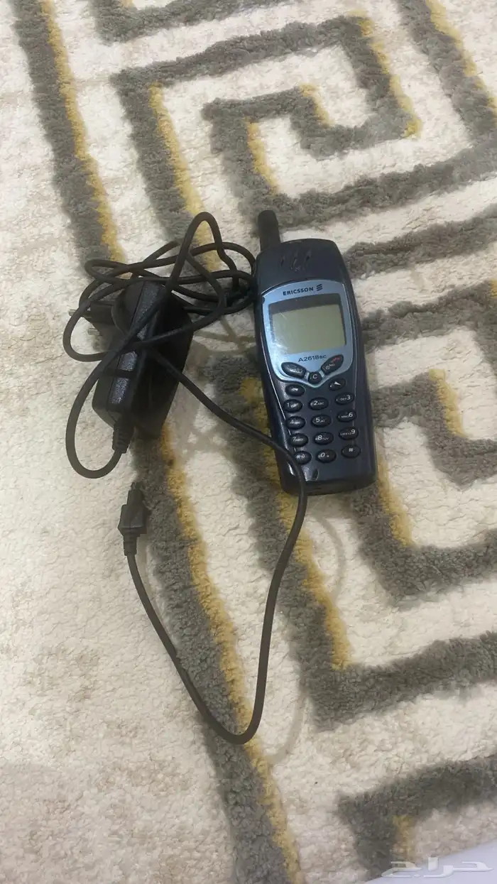جوال اركسون شغال مع الشاحن للبيع 1