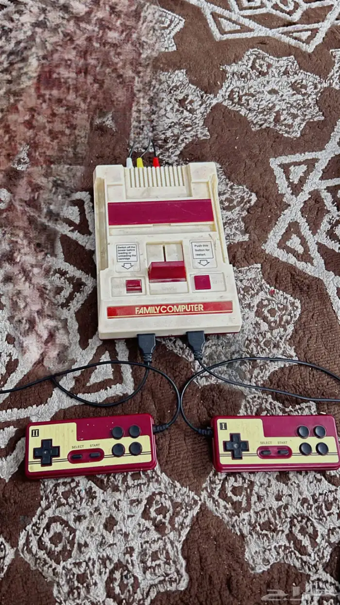 جهاز أتاري الأصلي مع وحدتين تحكم و زايد 9000لعبة 0