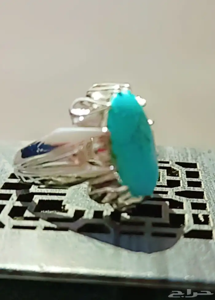 فيروز نيشابوري حبه شبه صافي فضه ثقيل تيتانيوم صياغة مشهد 0