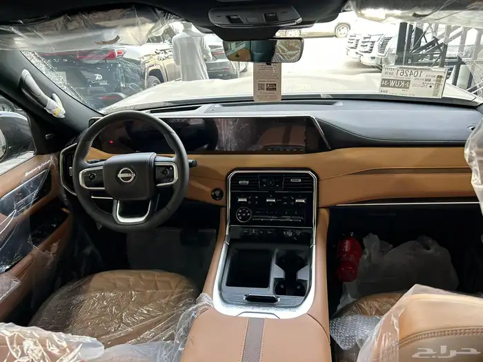 نيسان باترول 2025 بلاتينيوم توين تيربو متوفر لون ابيض واسود 18