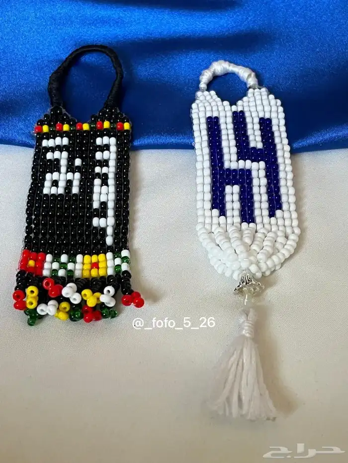 ميداليات مفاتيح خرز ب اسم ابو سعد و شعار الهلال 3