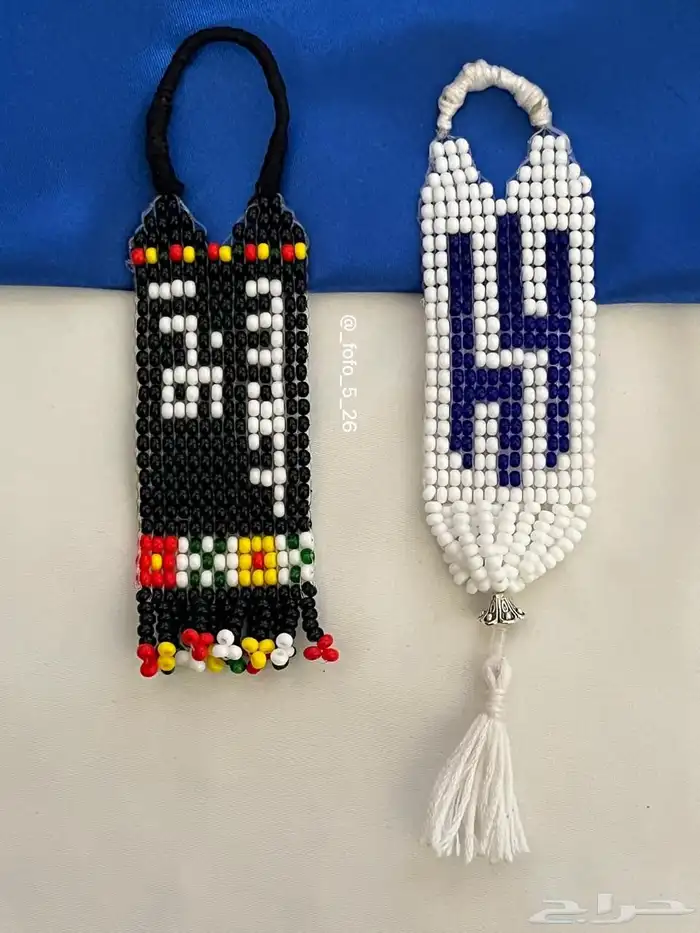 ميداليات مفاتيح خرز ب اسم ابو سعد و شعار الهلال 0