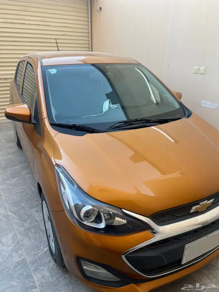 سيارة سبارك برتقالية استعمال نظيف 4