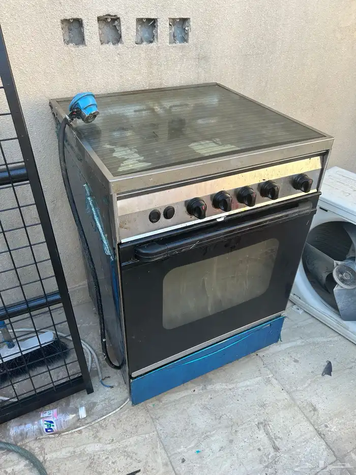 فرن غاز وغسالة وثلاجة 0