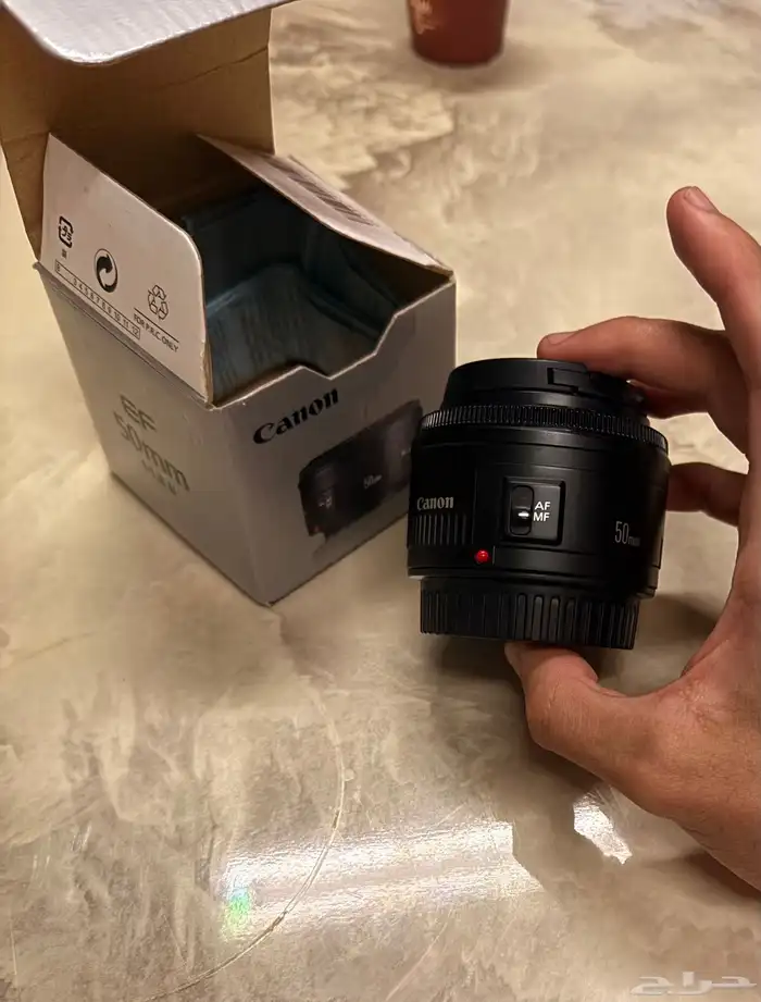 عدسة كاميرا كانون 50mm 1