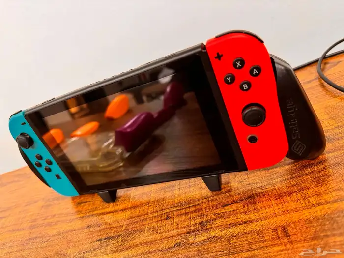 نينتندو سويتش كامل مع مسكتين مع ثلاث أشرطة مجانا  و 400Gb 6