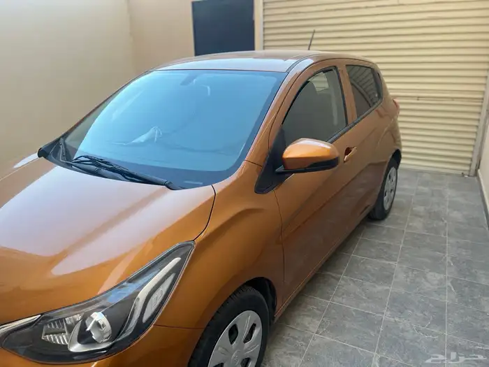 سيارة سبارك برتقالية استعمال نظيف 5