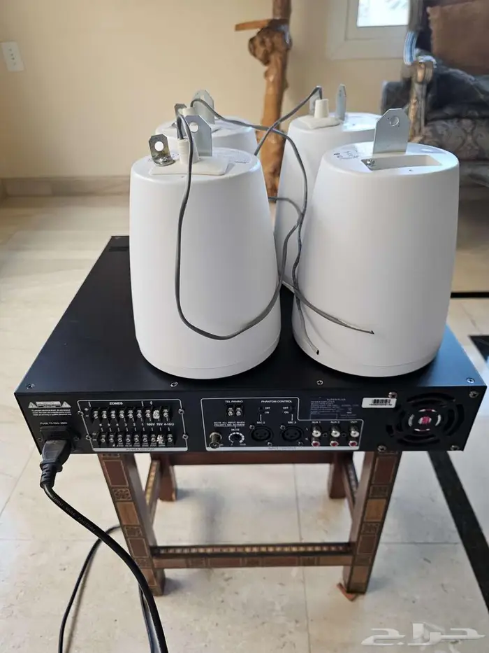 سماعات Bose معلقه مع رسيفر موسيقى 0