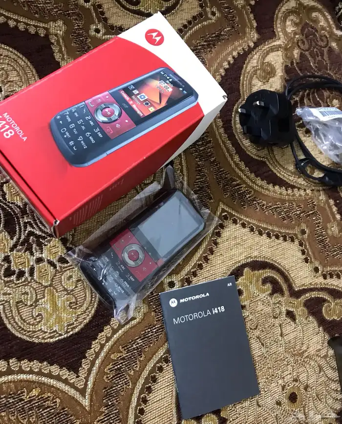 جوال موتوريلا برافو جديد بكرتونه واغراضه 4