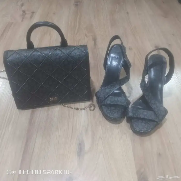 شنطه مع حذيان ماركه دكني شرط نظافه جدا جدا جدا 1