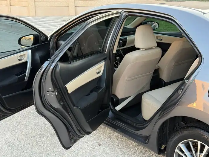 للبيع كورولا نص فل 2014 GL-I 9