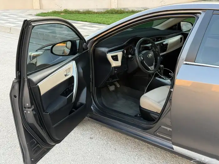 للبيع كورولا نص فل 2014 GL-I 8
