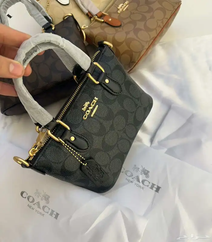 شنط ماركه كوتش شنط ماركات 1