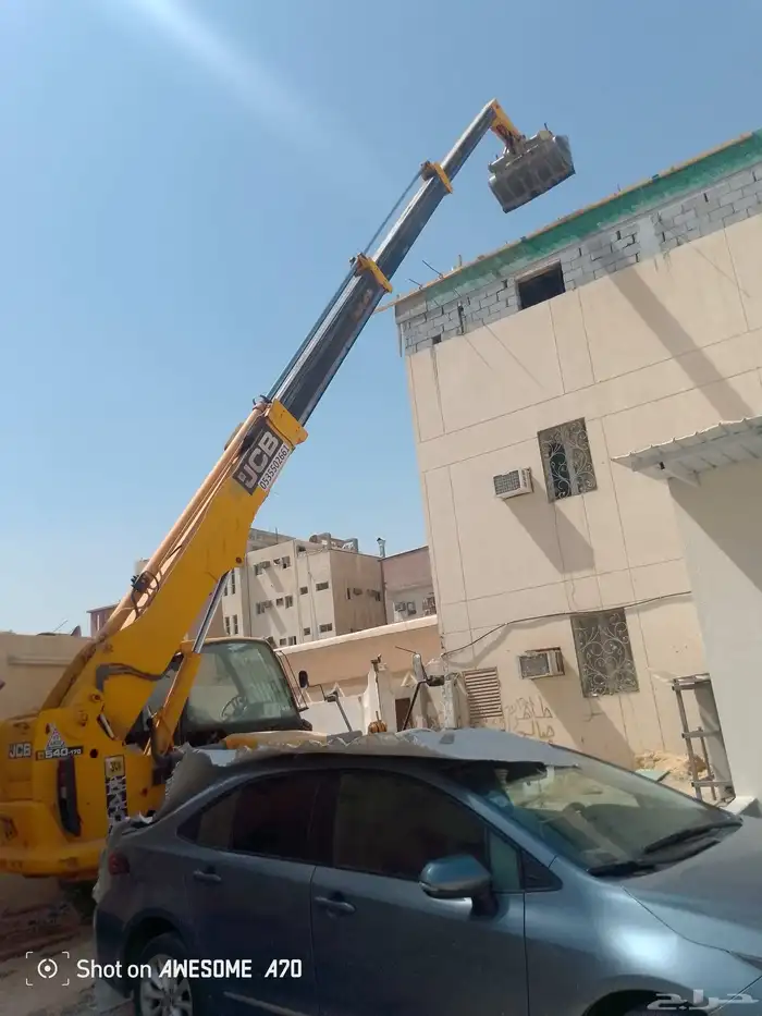 رفعه الرفع جميع مواد البناء يوميه وشهري وشغله وتنزيل مخلفات 2