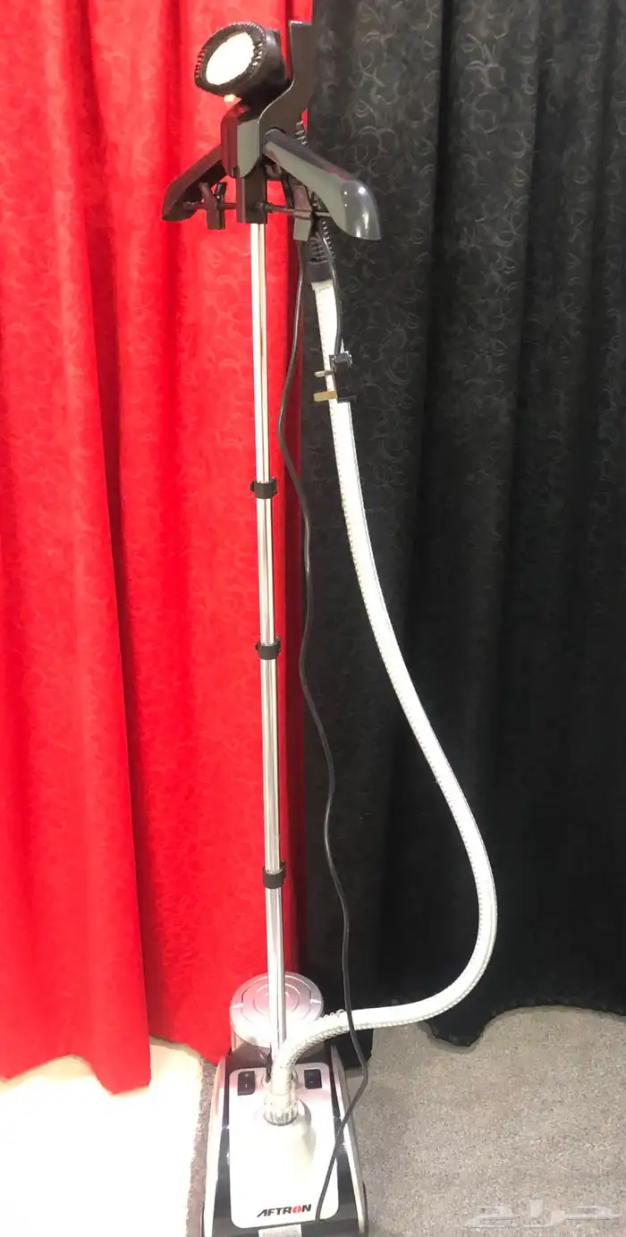 مكواة ملابس كهربائي بالبخار 0