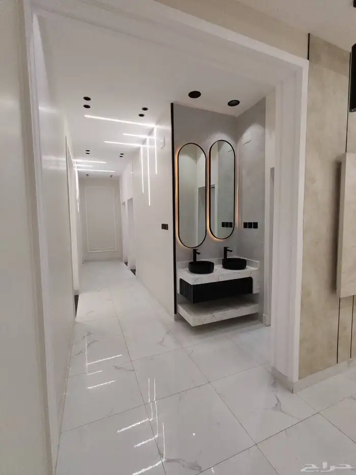 للبيع بحي الاسكان شقق علويه من 550 الف بسطح خاص ومصعد شغال 13