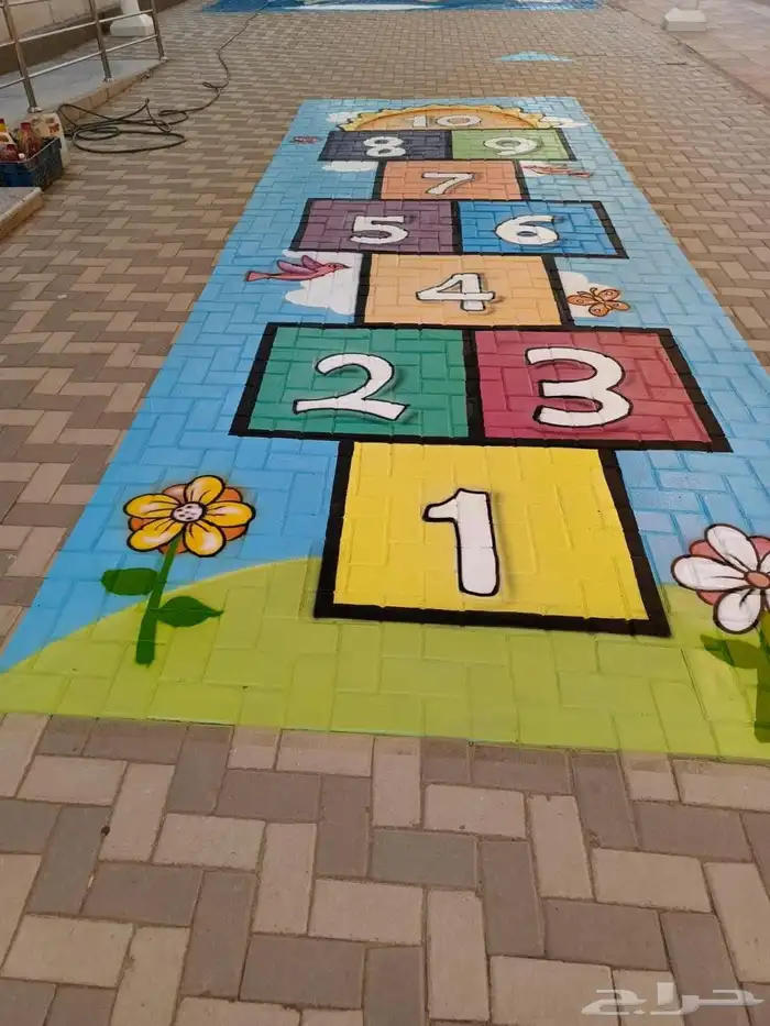 خطاط ورسام جده مكه رسومات علي الارض 1