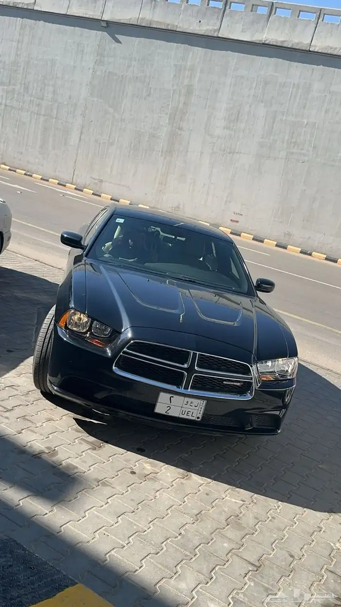 دودج تشارجر 2012  تم وضع الحد 57