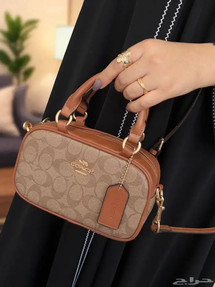 شنطة ماركة كوتش هاي كوالتي مع الملحقات شامل التوصيل والشحن 2