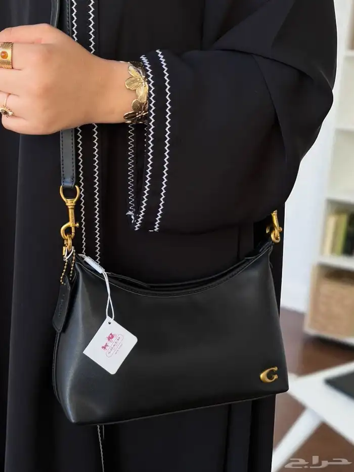 شنطة ماركة كوتش هاي كوالتي مع الملحقات شامل التوصيل والشحن 18