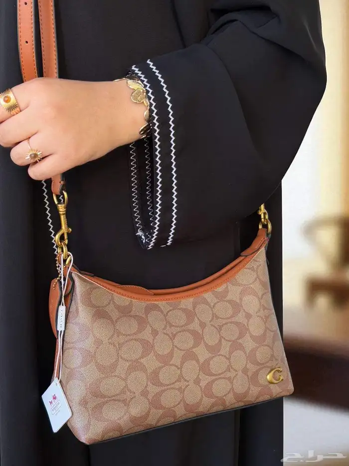 شنطة ماركة كوتش هاي كوالتي مع الملحقات شامل التوصيل والشحن 16