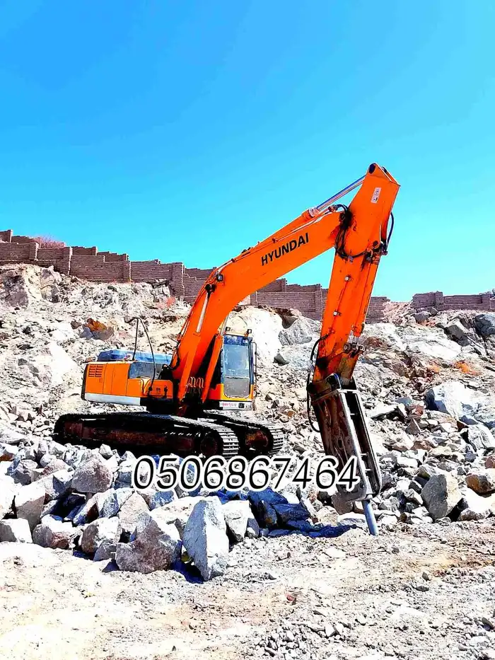 بوكلين للايجار تكسير الجبال هدم المباني 0