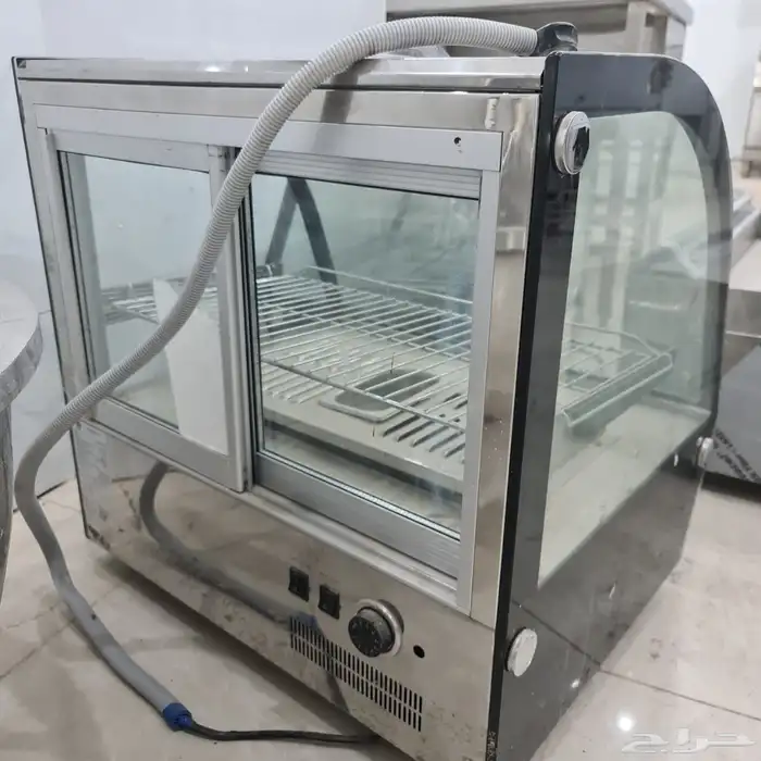 مكينه قهوه ايطالي جديده لم تستخدم وكذالك سخانات مخبوزات 0