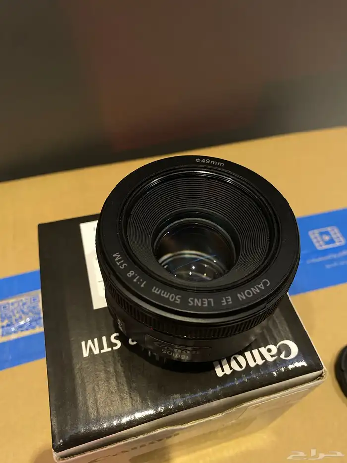 عدسه كانون 50mm f1.8 و عدسه 18-45 1