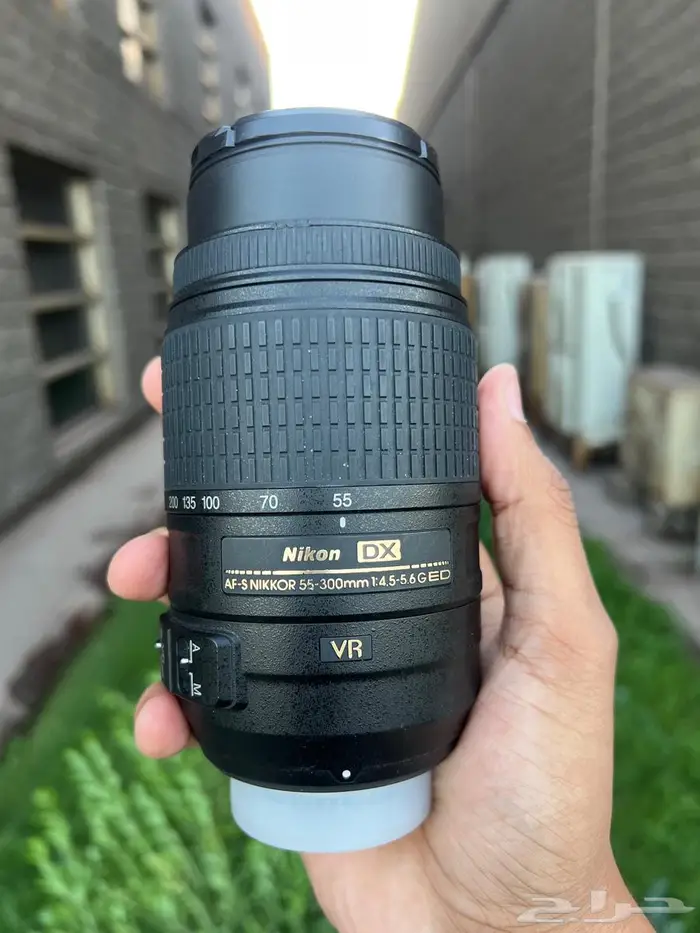 عدسة نيكون أصلية 55-200mm بحالة ممتازة  تعمل بكفاءة تامة 3