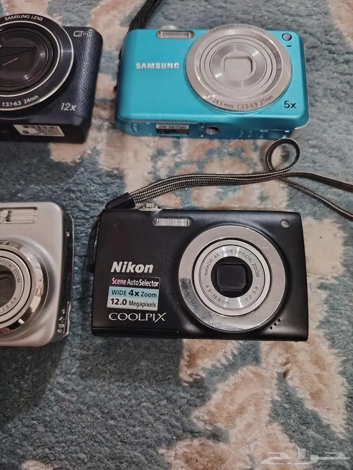كاميرا ديجيتال نيكون و سامسونج زي الجديد 4