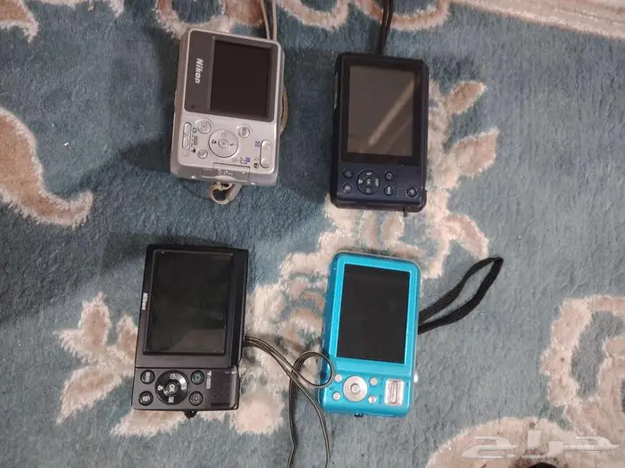 كاميرا ديجيتال نيكون و سامسونج زي الجديد 3