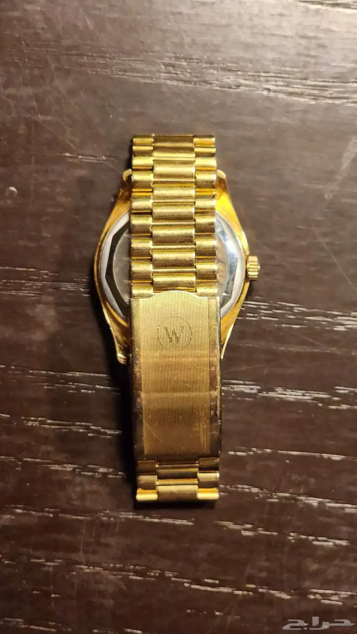 ساعة ام صليب قديمه West End Watch Co 2