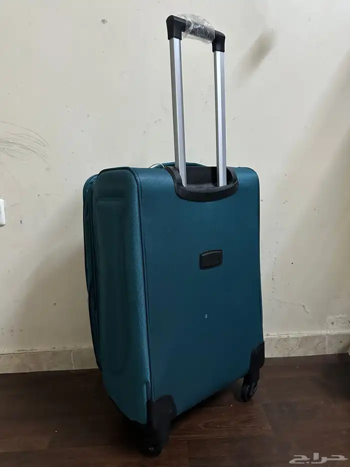 شنطة سفر مقاس وسط 1