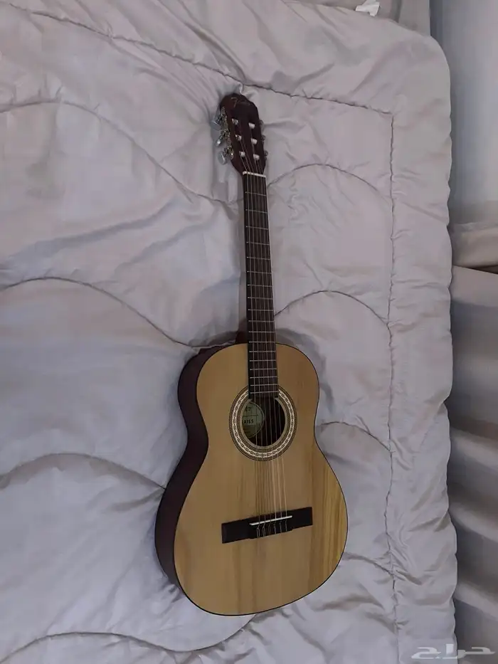 اله عزف موسيقي 0