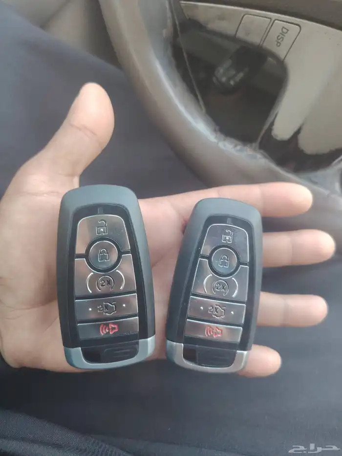 محل نسخ مفاتيح وبرمجه سيارات وفك ابواب سيارات 0