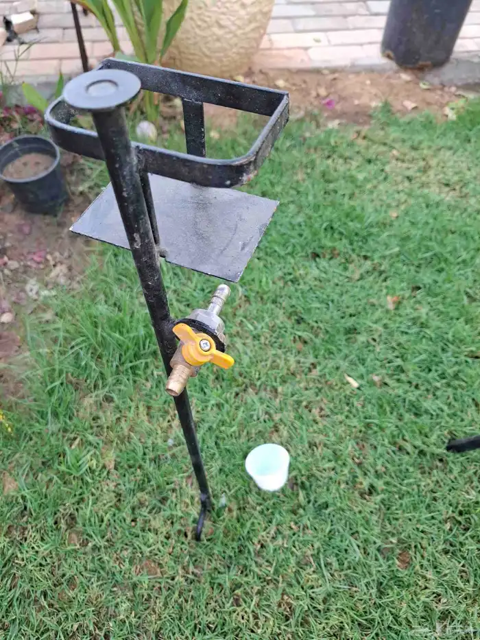 قاعدة صنبور بزبوز ماء للرحلات 0