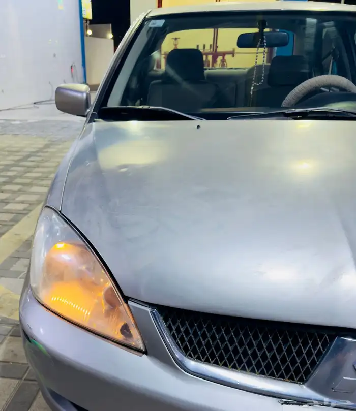 لانسر بومه 2009 11