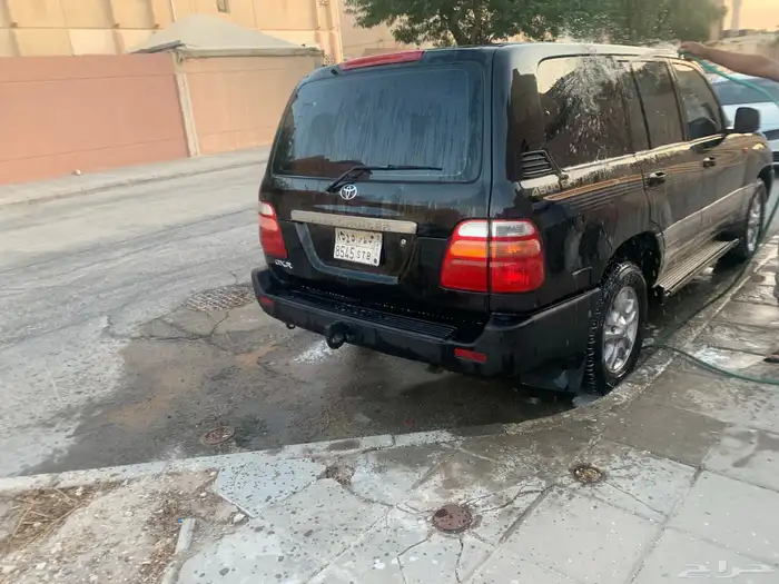 لاندكروزر 2002 اسود فتحه ثلاجه مكيفين 4